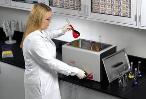  Woman Using tuttnauer Ultrasonic Cleaner